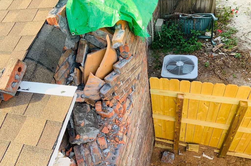 Tearing down a chimney in Shalimar