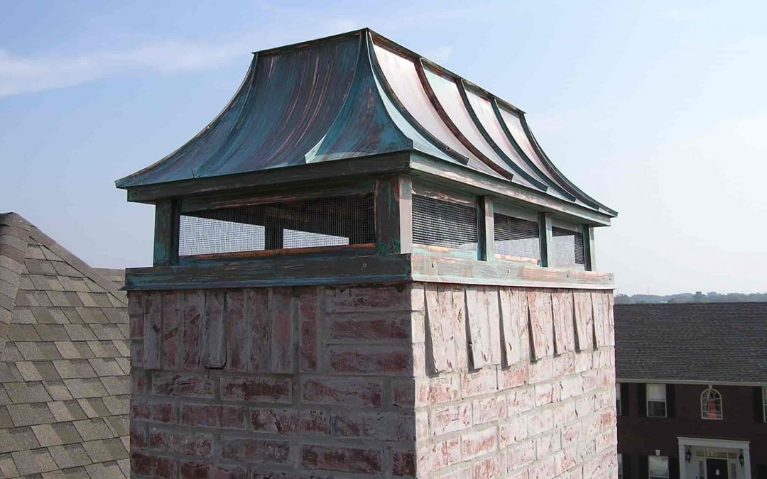 patina chimney cap installation on masonry chimney