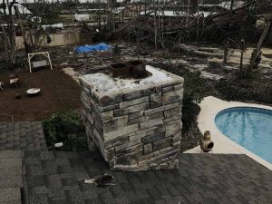 Cameron Sootmaster team rebuilding chimney