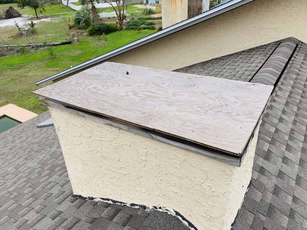 Sootmaster rebuilding a prefab chimney in Moss Bluffs