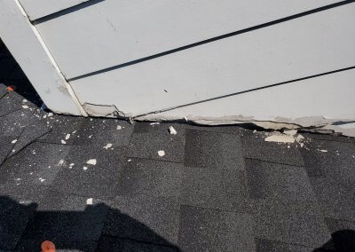 seam broken on where chimney meets the roof