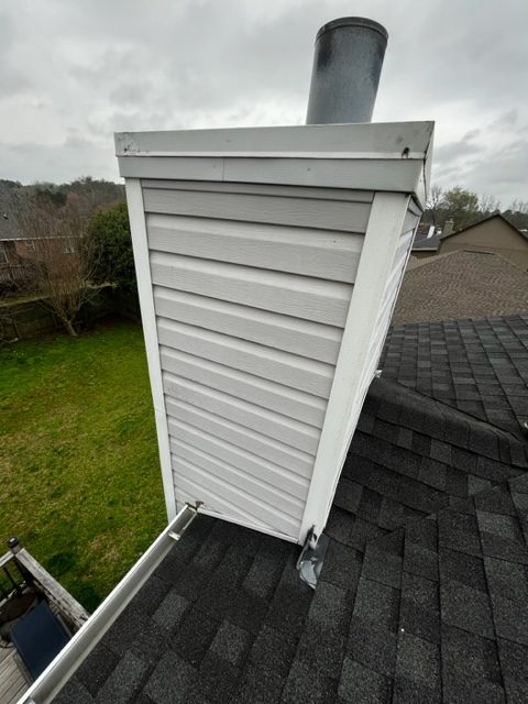 Atlanta Background Image - A recently repaired chimney before a bad storm hits