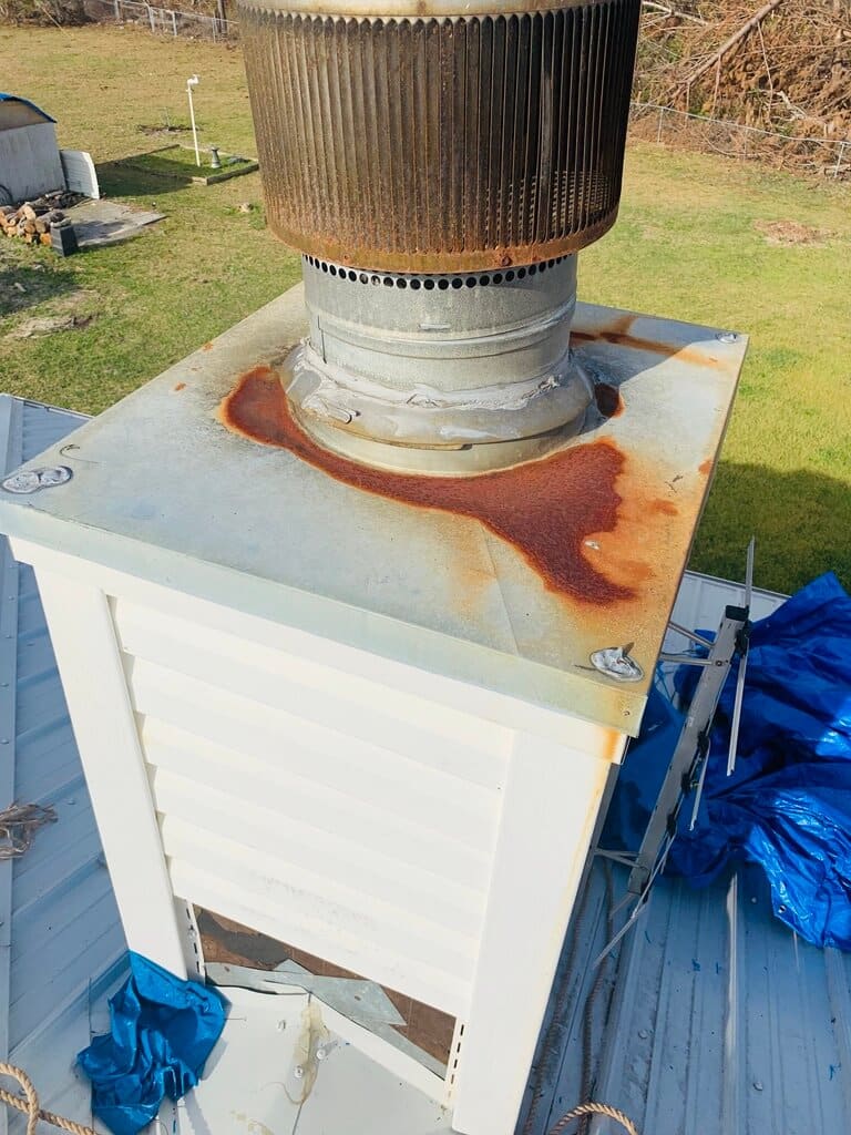 Rusty Chimney Cap Discovered by Chimney Sweep Mandeville